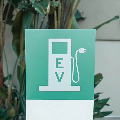 An electric vehicle charger sign.